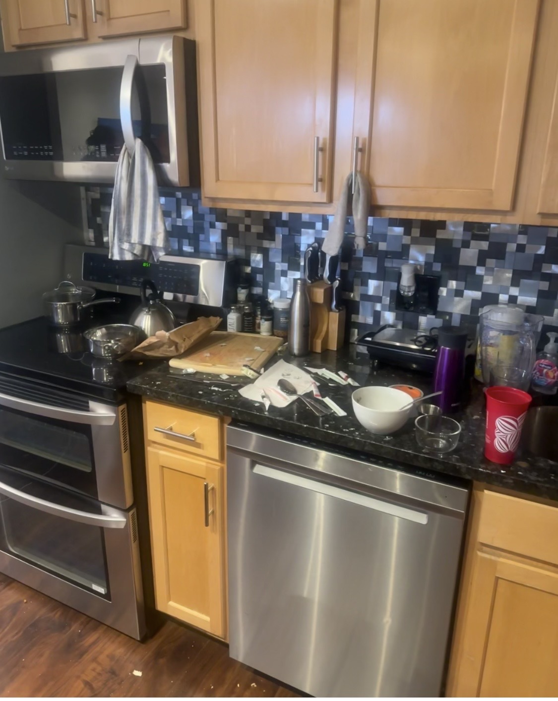 Before cleaning: a kitchen counter beside the dishwasher