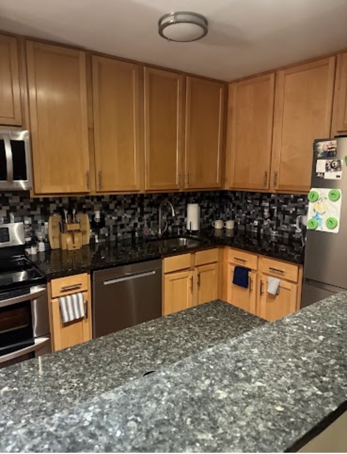 After cleaning: a kitchen counter beside the dishwasher