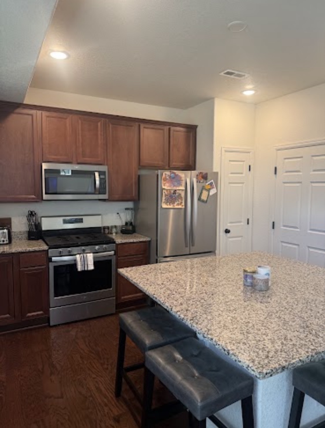 After: clear island, stove, and countertops