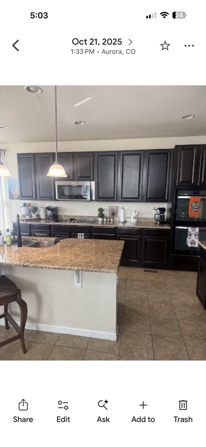 After: clean tile floor and cleared kitchen island